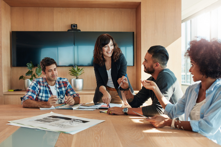 Professionals having a business discussion in a meeting room