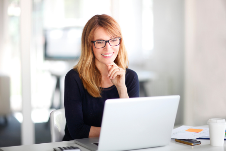 woman using laptop computer